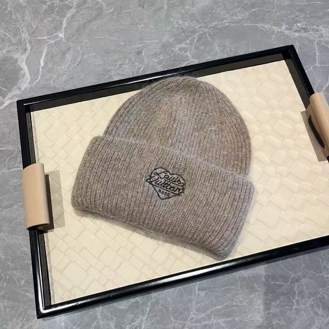 Unisex mohair winter beanie with a heart-shaped embroidery and a folded cuff